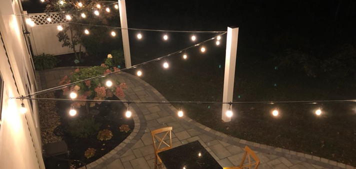 String lights over paver patio